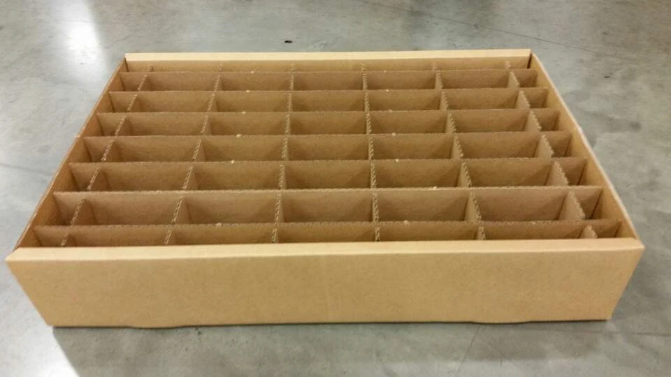Joy Packaging carton with a fitted grid of corrugated dividers